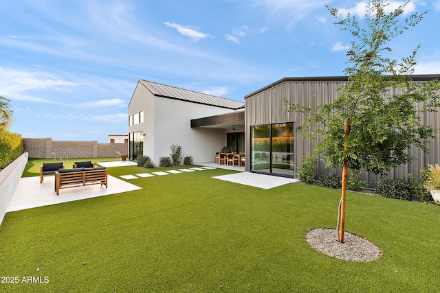 1013 W Ardmore Rd, Phoenix, AZ 85041 - rear view of property with a patio, an outdoor living space, a standing seam roof, and metal roof