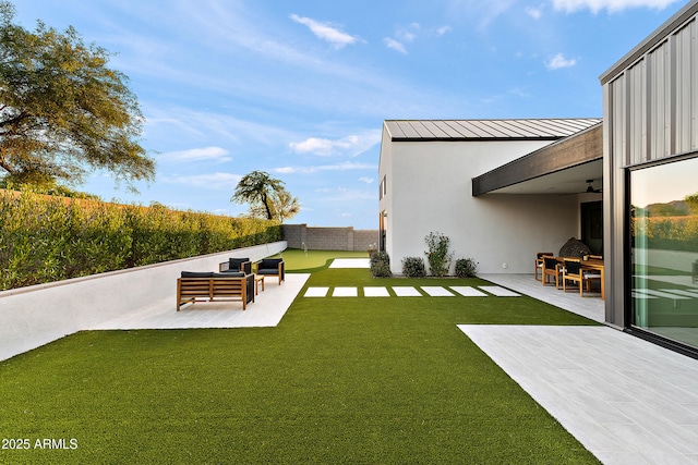 1013 W Ardmore Rd, Phoenix, AZ 85041 - view of yard featuring an outdoor hangout area, ceiling fan, and a patio