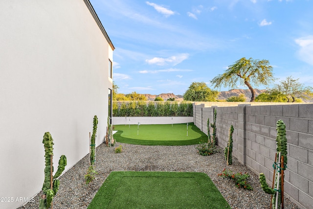 1013 W Ardmore Rd, Phoenix, AZ 85041 - fenced backyard featuring an area to practice putting