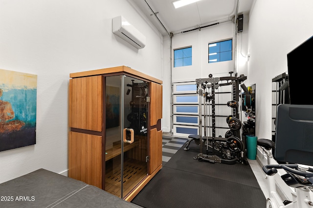 1013 W Ardmore Rd, Phoenix, AZ 85041 - workout area featuring a wall unit AC and a towering ceiling
