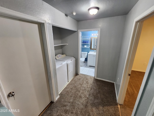 laundry area featuring carpet floors, laundry area, and washer and dryer