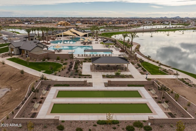 birds eye view of property featuring a residential view and a water view