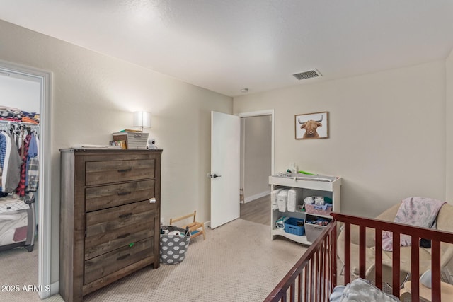 22534 W Pima St, Buckeye, AZ 85326 - bedroom with carpet, a walk in closet, a closet, and baseboards