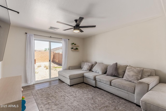 22534 W Pima St, Buckeye, AZ 85326 - living room featuring ceiling fan and wood finished floors