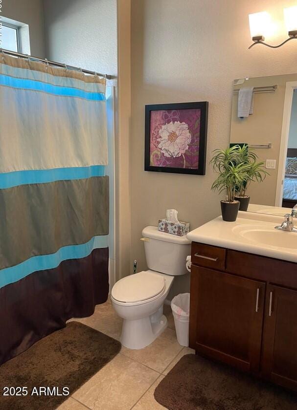 6605 N 93rd Ave Unit 1071, Glendale, AZ 85305 - full bath featuring tile patterned floors, vanity, toilet, and curtained shower