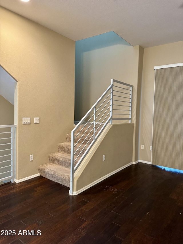 6605 N 93rd Ave Unit 1071, Glendale, AZ 85305 - staircase with hardwood / wood-style floors and baseboards