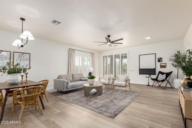 896 E Indian Wells Pl, Chandler, AZ 85249 - living area featuring light wood-type flooring, ceiling fan, baseboards, and recessed lighting