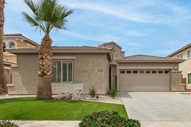 896 E Indian Wells Pl, Chandler, AZ 85249 - view of front facade with an attached garage, driveway, a front yard, and stucco siding