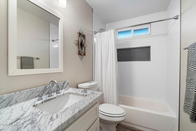 5707 N 12th Pl, Phoenix, AZ 85014 - full bathroom featuring toilet, shower / bath combination with curtain, and vanity