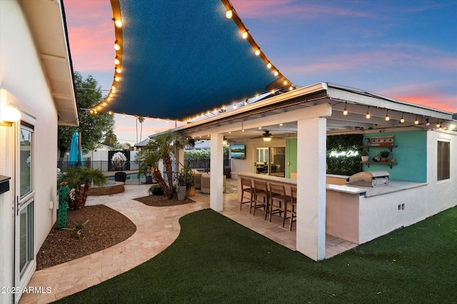5707 N 12th Pl, Phoenix, AZ 85014 - fenced backyard featuring a patio area and grilling area