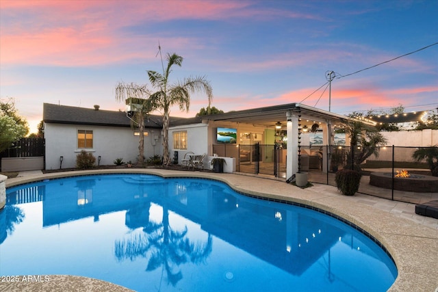 5707 N 12th Pl, Phoenix, AZ 85014 - view of swimming pool with an outdoor fire pit and a patio area