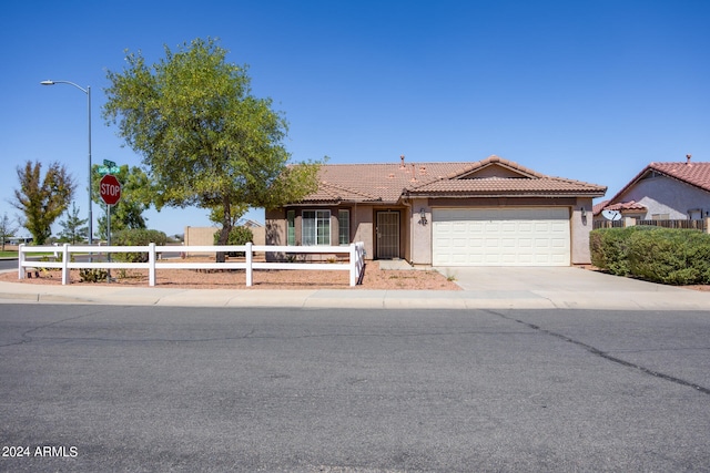 view of front of property featuring a garage