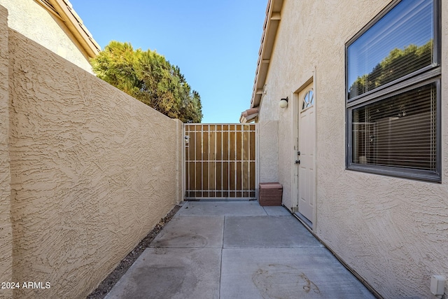 view of side of home featuring a patio area