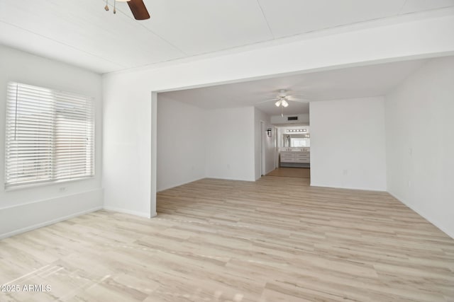 unfurnished room featuring ceiling fan and light hardwood / wood-style flooring