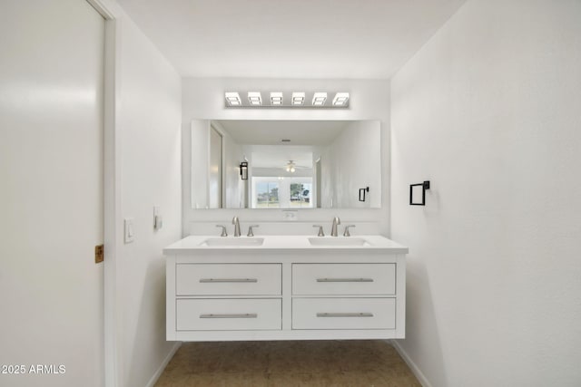 bathroom featuring ceiling fan and vanity