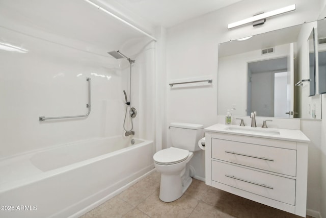 full bathroom featuring bathtub / shower combination, vanity, toilet, and tile patterned flooring