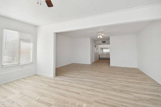 spare room featuring light hardwood / wood-style floors