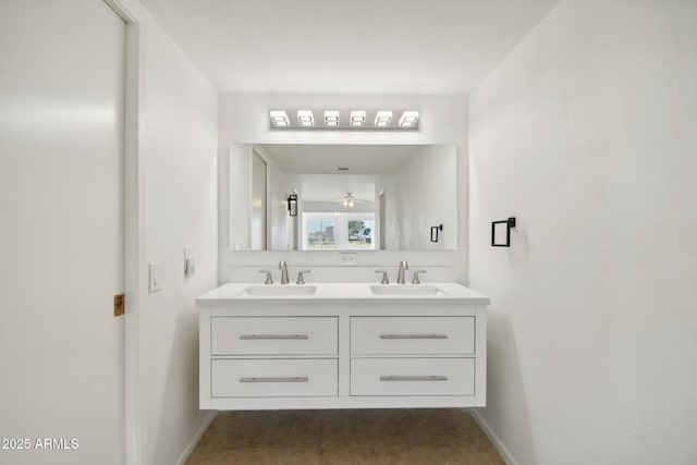 bathroom with ceiling fan and vanity