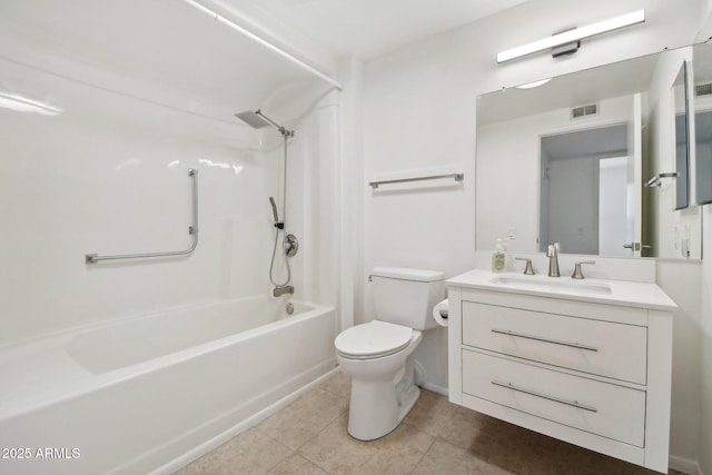 full bathroom featuring tile patterned flooring, toilet, vanity, and tub / shower combination