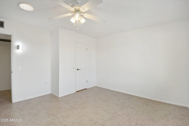 empty room featuring ceiling fan