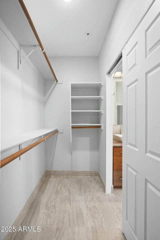 view of walk in closet