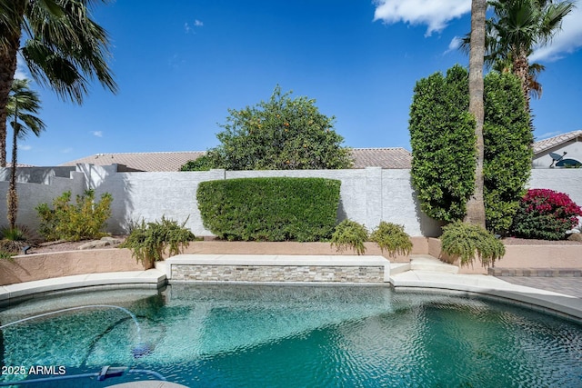 view of pool featuring a fenced in pool and a fenced backyard