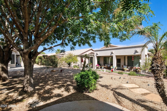 4540 E Mia Ln, Gilbert, AZ 85298 - rear view of property featuring an outdoor hangout area and stucco siding