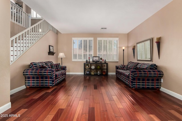 3065 E Harvard Ave, Gilbert, AZ 85234 - living room with baseboards, wood finished floors, and stairway