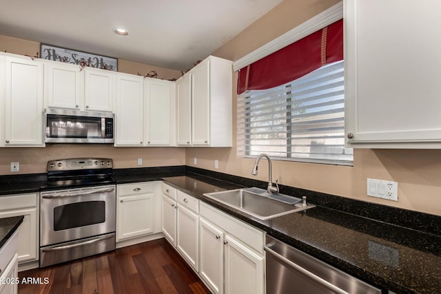 3065 E Harvard Ave, Gilbert, AZ 85234 - kitchen featuring stainless steel appliances, a sink, dark wood-style floors, white cabinets, and recessed lighting