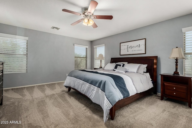 3065 E Harvard Ave, Gilbert, AZ 85234 - bedroom featuring carpet, multiple windows, baseboards, and ceiling fan