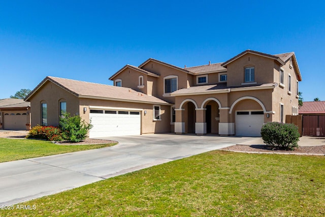 3065 E Harvard Ave, Gilbert, AZ 85234 - mediterranean / spanish house with stucco siding, driveway, and an attached garage
