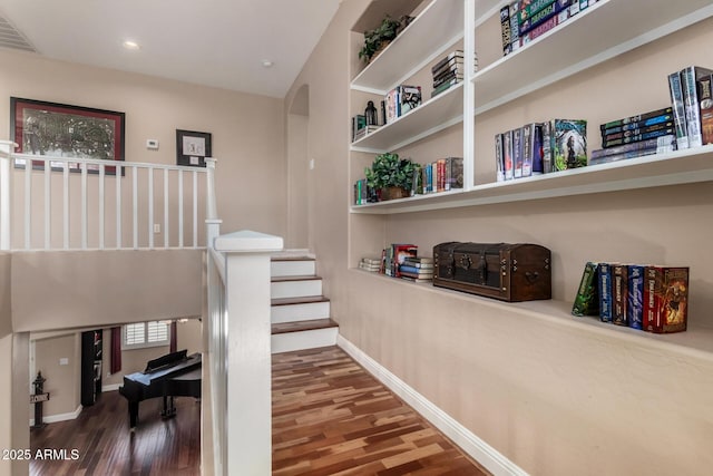 3065 E Harvard Ave, Gilbert, AZ 85234 - stairway featuring wood finished floors, baseboards, arched walkways, and recessed lighting