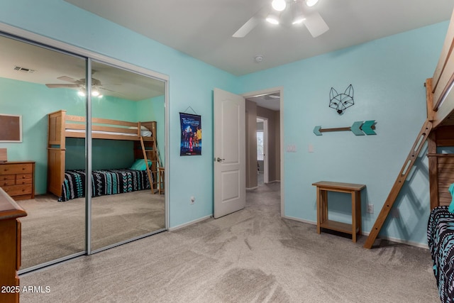 3065 E Harvard Ave, Gilbert, AZ 85234 - carpeted bedroom with a closet, a ceiling fan, and baseboards