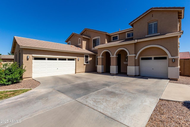 3065 E Harvard Ave, Gilbert, AZ 85234 - mediterranean / spanish house featuring stucco siding, concrete driveway, and a tile roof