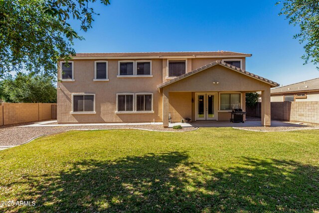 3065 E Harvard Ave, Gilbert, AZ 85234 - back of property with french doors, stucco siding, and a patio