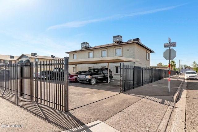 view of front of house featuring a carport