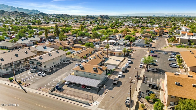 drone / aerial view featuring a mountain view