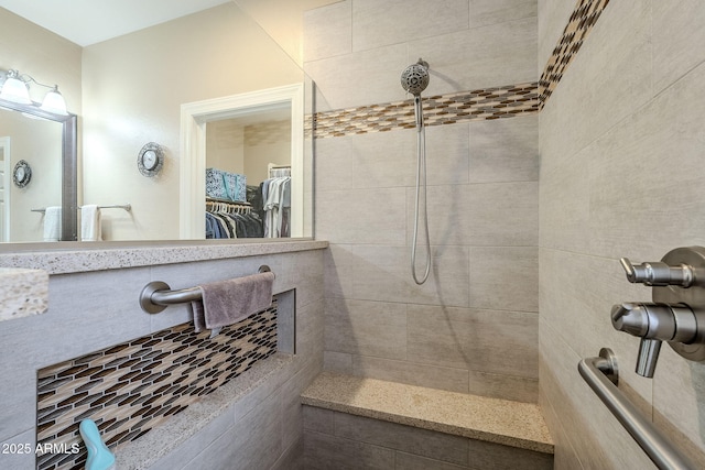 bathroom featuring tiled shower