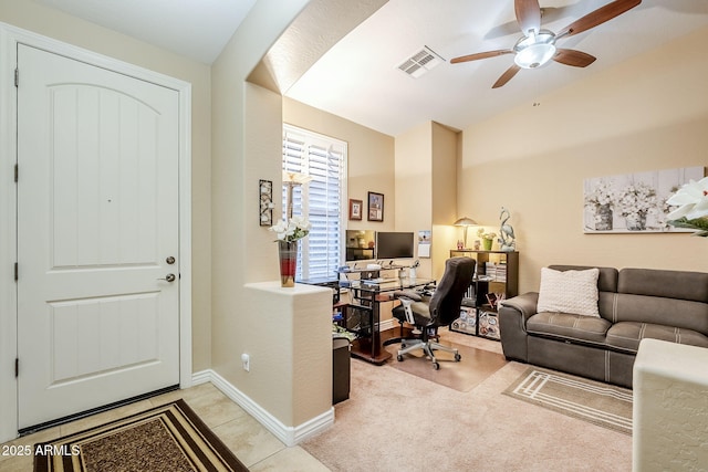 office with vaulted ceiling, ceiling fan, and light colored carpet