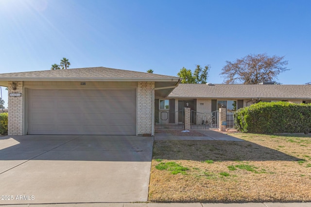 ranch-style house featuring a garage