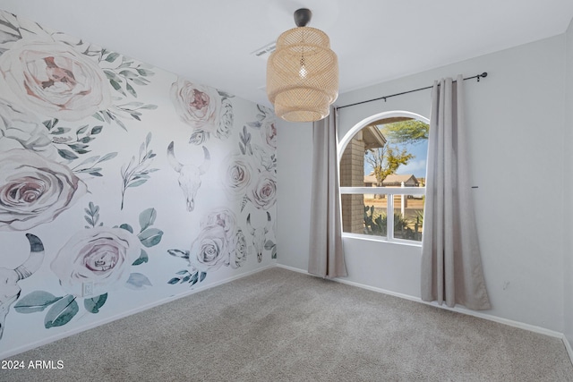 carpeted empty room featuring a healthy amount of sunlight