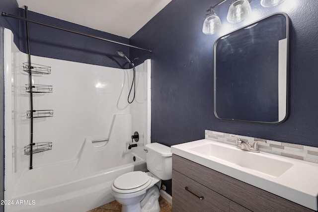 full bathroom with vanity, shower / tub combination, backsplash, tile patterned flooring, and toilet