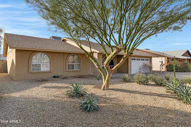 ranch-style home with a garage