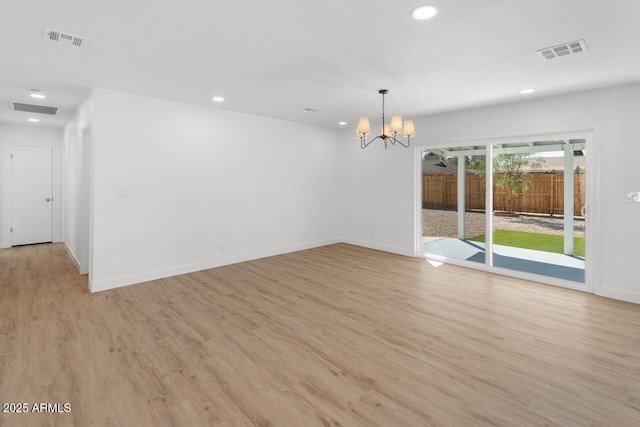 6610 N 15th Ave, Phoenix, AZ 85015 - empty room featuring a chandelier, visible vents, and recessed lighting