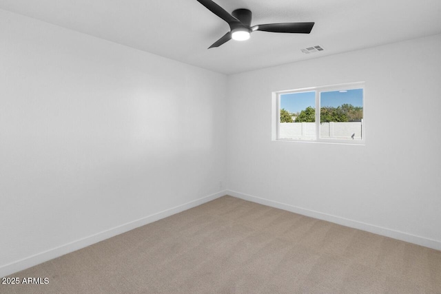 6610 N 15th Ave, Phoenix, AZ 85015 - empty room with baseboards, visible vents, light colored carpet, and ceiling fan