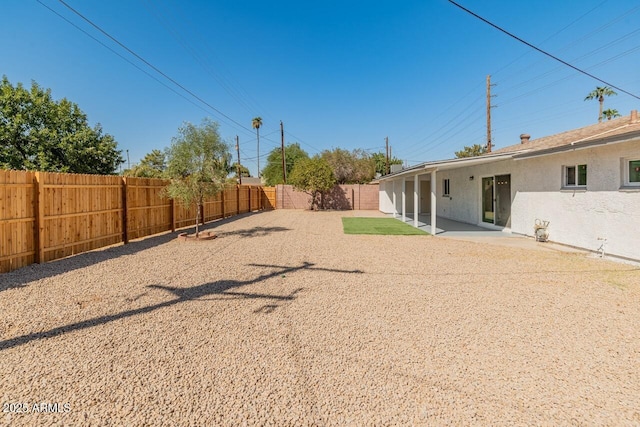 6610 N 15th Ave, Phoenix, AZ 85015 - view of yard featuring a patio and a fenced backyard