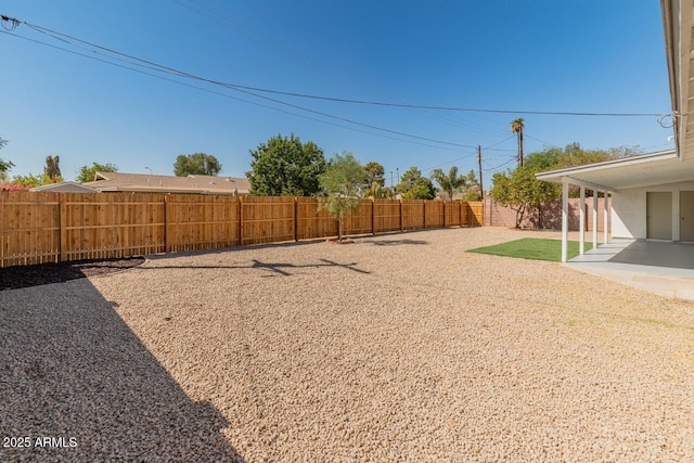 6610 N 15th Ave, Phoenix, AZ 85015 - view of yard featuring a fenced backyard and a patio