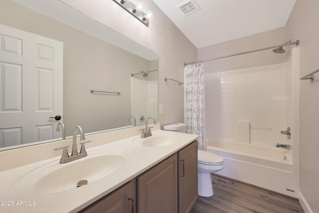 5744 E Jacaranda St, Mesa, AZ 85205 - bathroom with shower / bath combo, double vanity, and wood finished floors