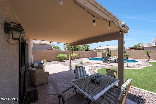5744 E Jacaranda St, Mesa, AZ 85205 - fenced backyard with a patio area and outdoor dining space