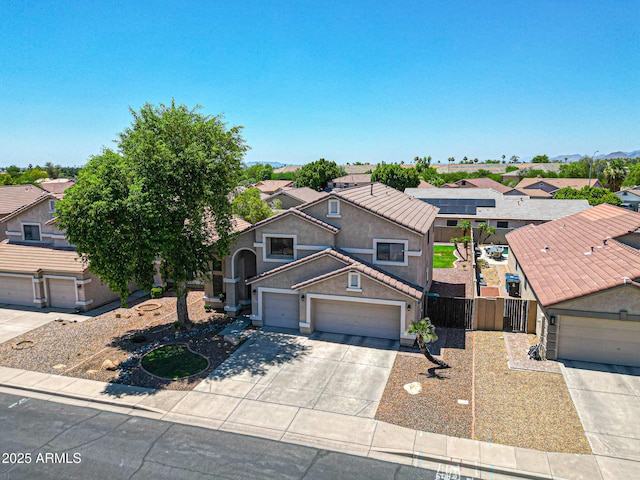 5744 E Jacaranda St, Mesa, AZ 85205 - view of front of home with a residential view, a gate, stucco siding, driveway, and a tile roof